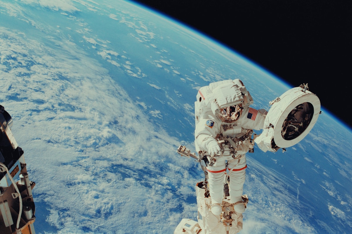 Astronaut on a spacewalk high above the Earth
